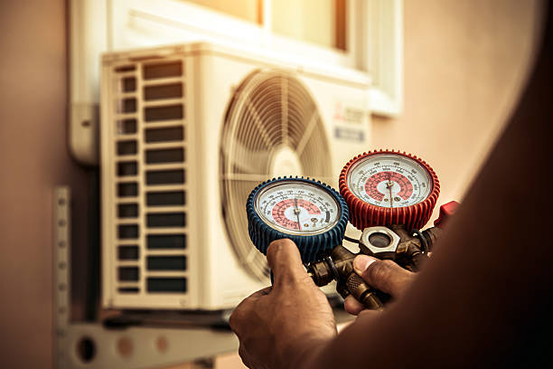 Professional Air Conditioning Service technician working in Elburn, IL